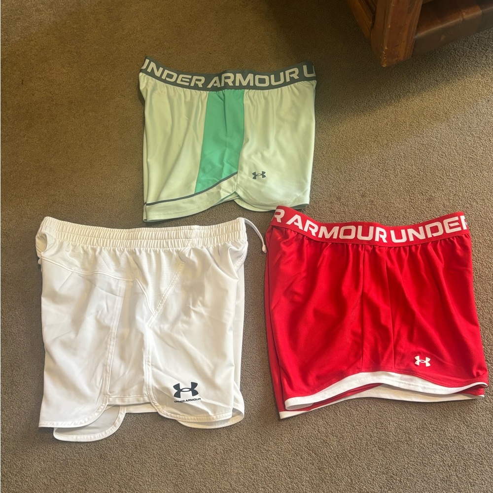 3 pairs of Under Armour shorts.